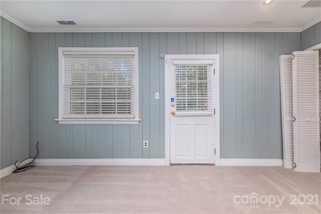 4211 Murrayhill Road Charlotte, NC 28209 - Photo 16 of 18 a view of an empty room with a window