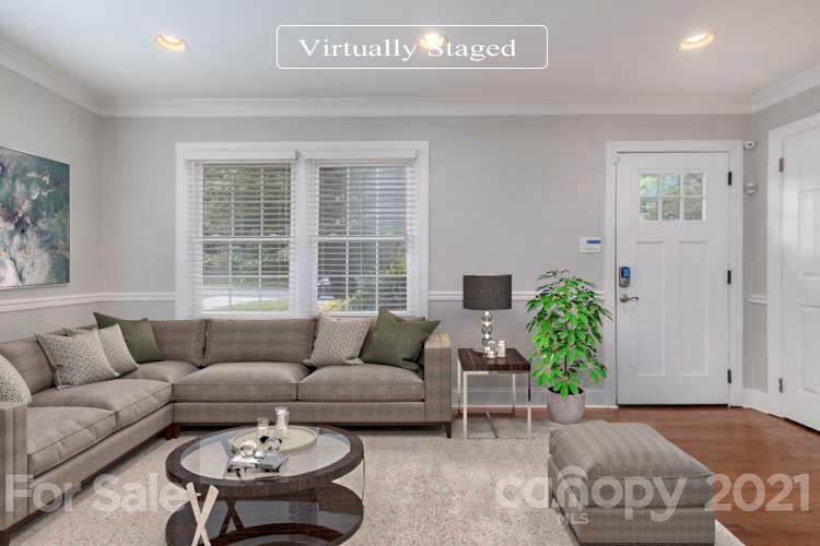 4211 Murrayhill Road Charlotte, NC 28209 - Photo 2 of 18 a living room with furniture and a potted plant