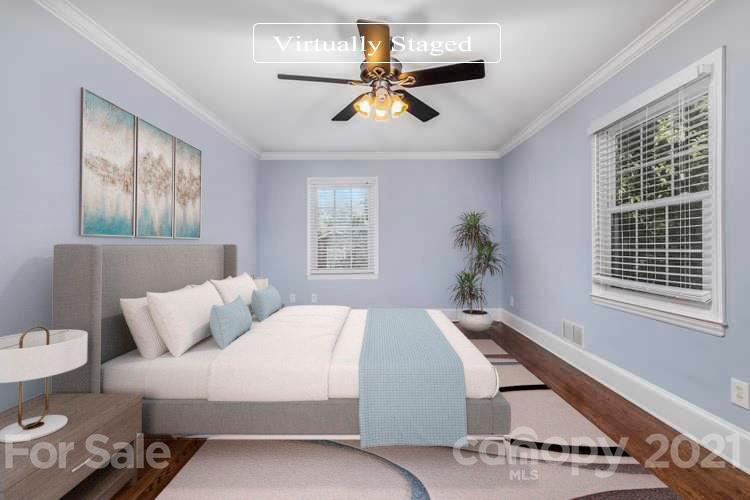 4211 Murrayhill Road Charlotte, NC 28209 - Photo 3 of 18 a bedroom with a bed and window