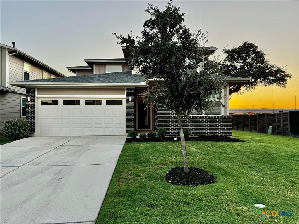 100 Geminiflora Bend Leander, TX 78641 - Photo 2 of 38 a front view of a house with a yard