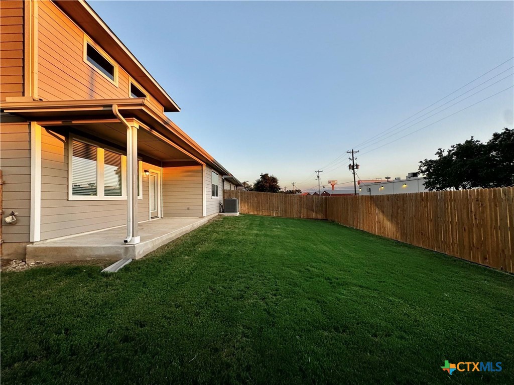 100 Geminiflora Bend Leander, TX 78641 - Photo 33 of 38 a backyard of a house with lots of green space