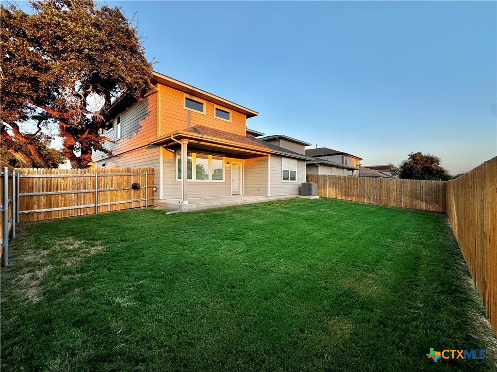 100 Geminiflora Bend Leander, TX 78641 - Photo 34 of 38 a front view of a house with a yard