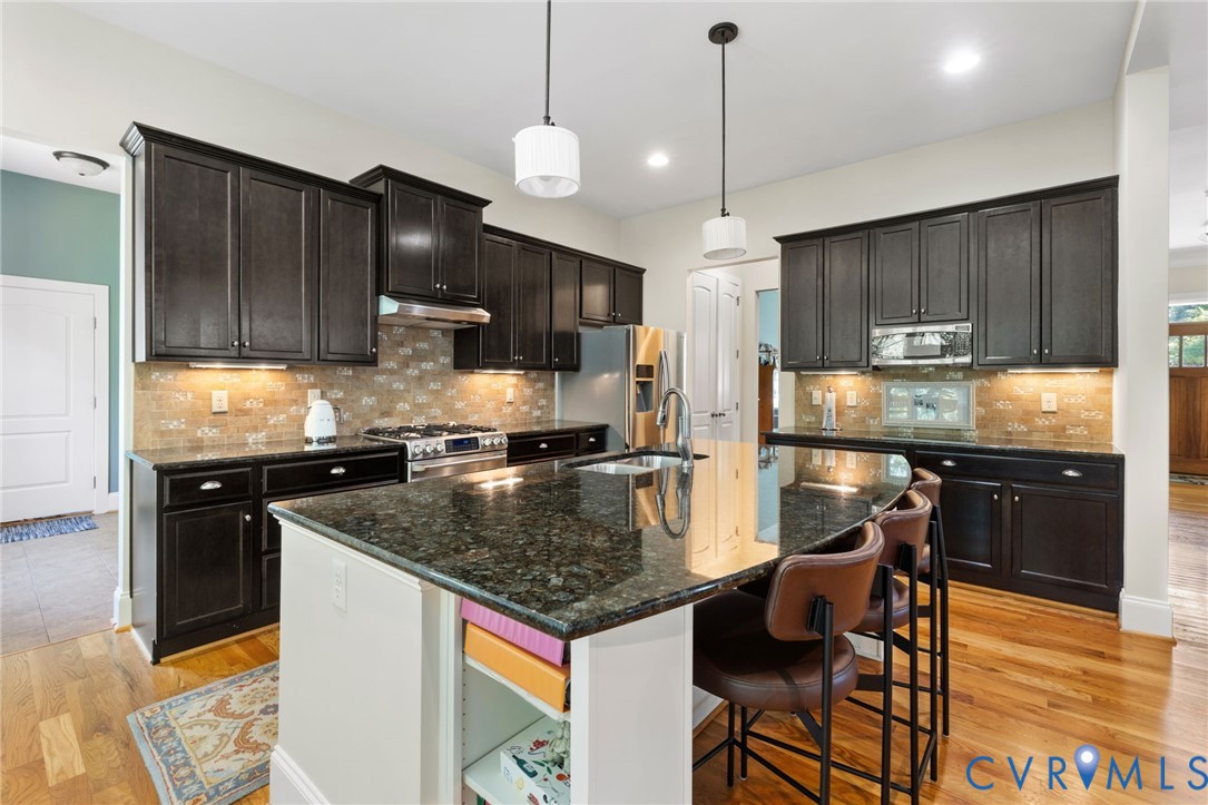 15936 Alsdell Road Midlothian, VA 23112 - Photo 15 of 45 Gourmet kitchen featuring a large island with an u