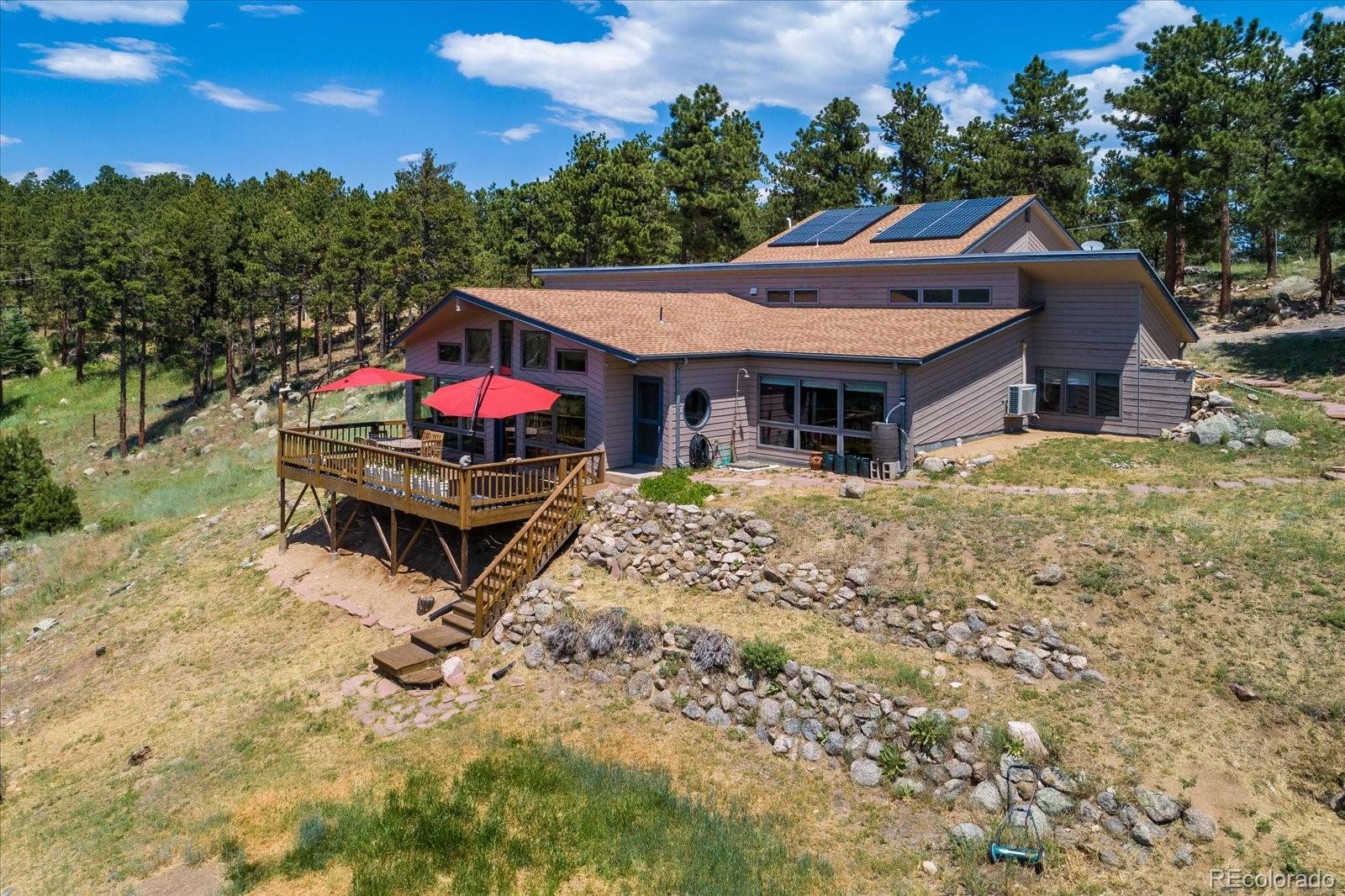 326 Peakview Road Boulder, CO 80302 - Photo 1 of 29 a view of a house with a yard