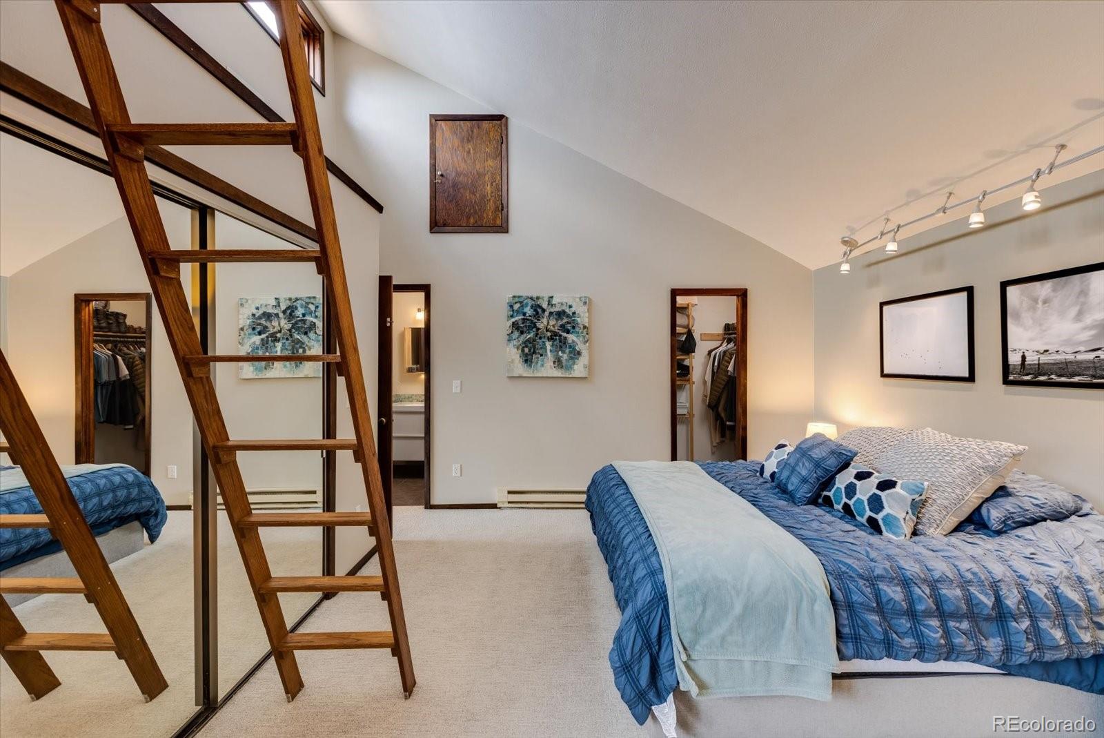 326 Peakview Road Boulder, CO 80302 - Photo 15 of 29 a bedroom with furniture and wooden floor