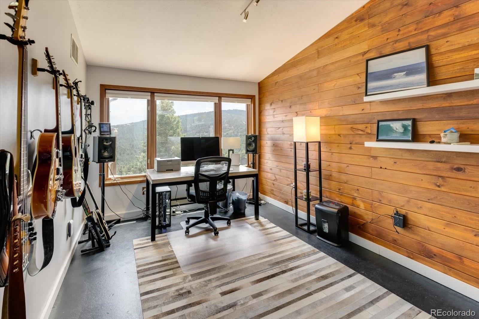 326 Peakview Road Boulder, CO 80302 - Photo 17 of 29 a view of a workspace with furniture
