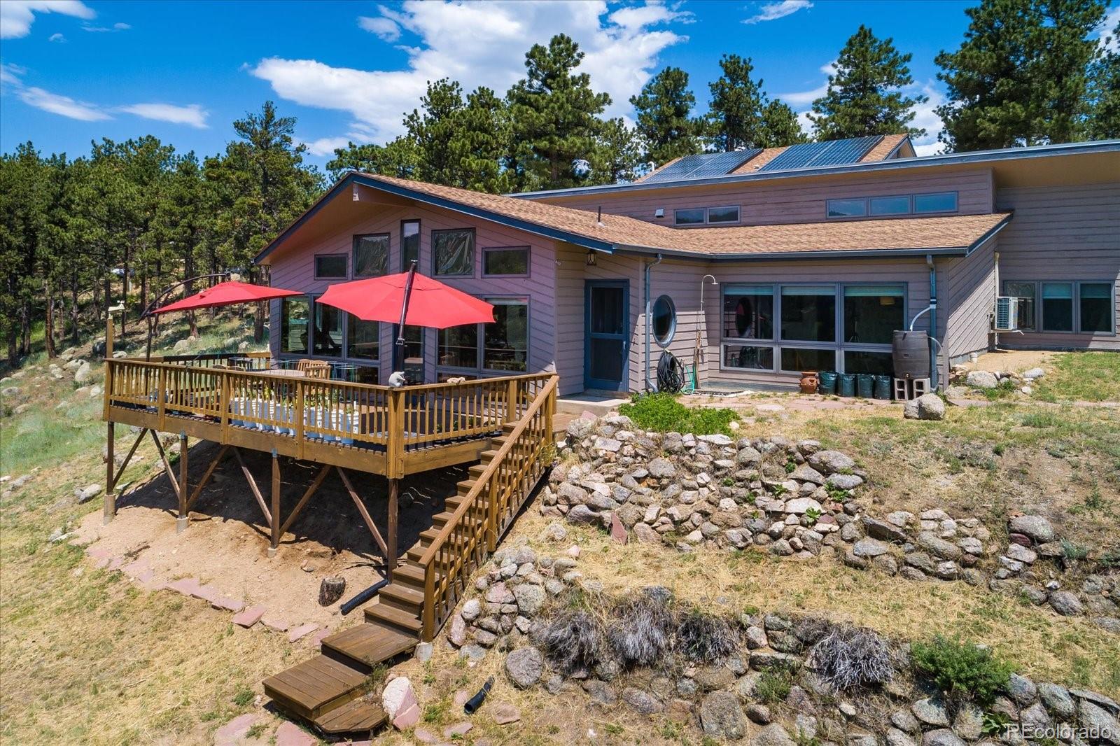 326 Peakview Road Boulder, CO 80302 - Photo 2 of 29 an outdoor space with lots of trees