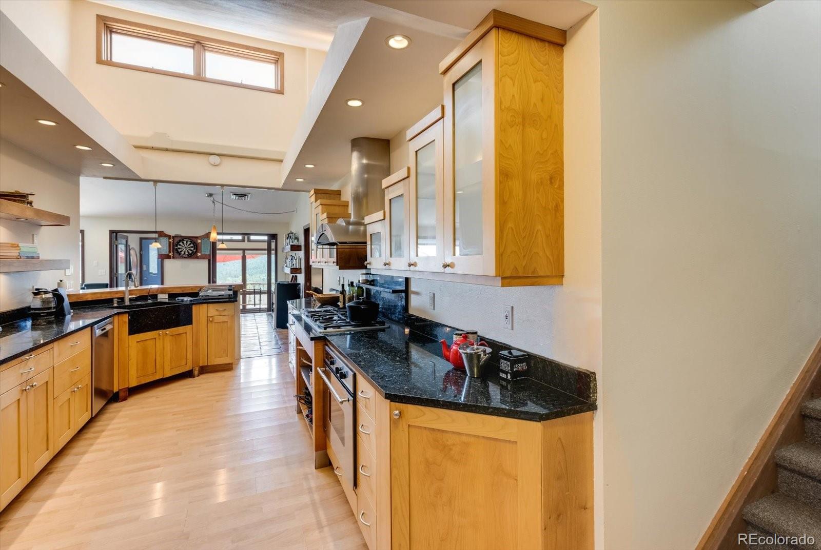 326 Peakview Road Boulder, CO 80302 - Photo 8 of 29 a kitchen with lots of counter top space and stainless steel appliances