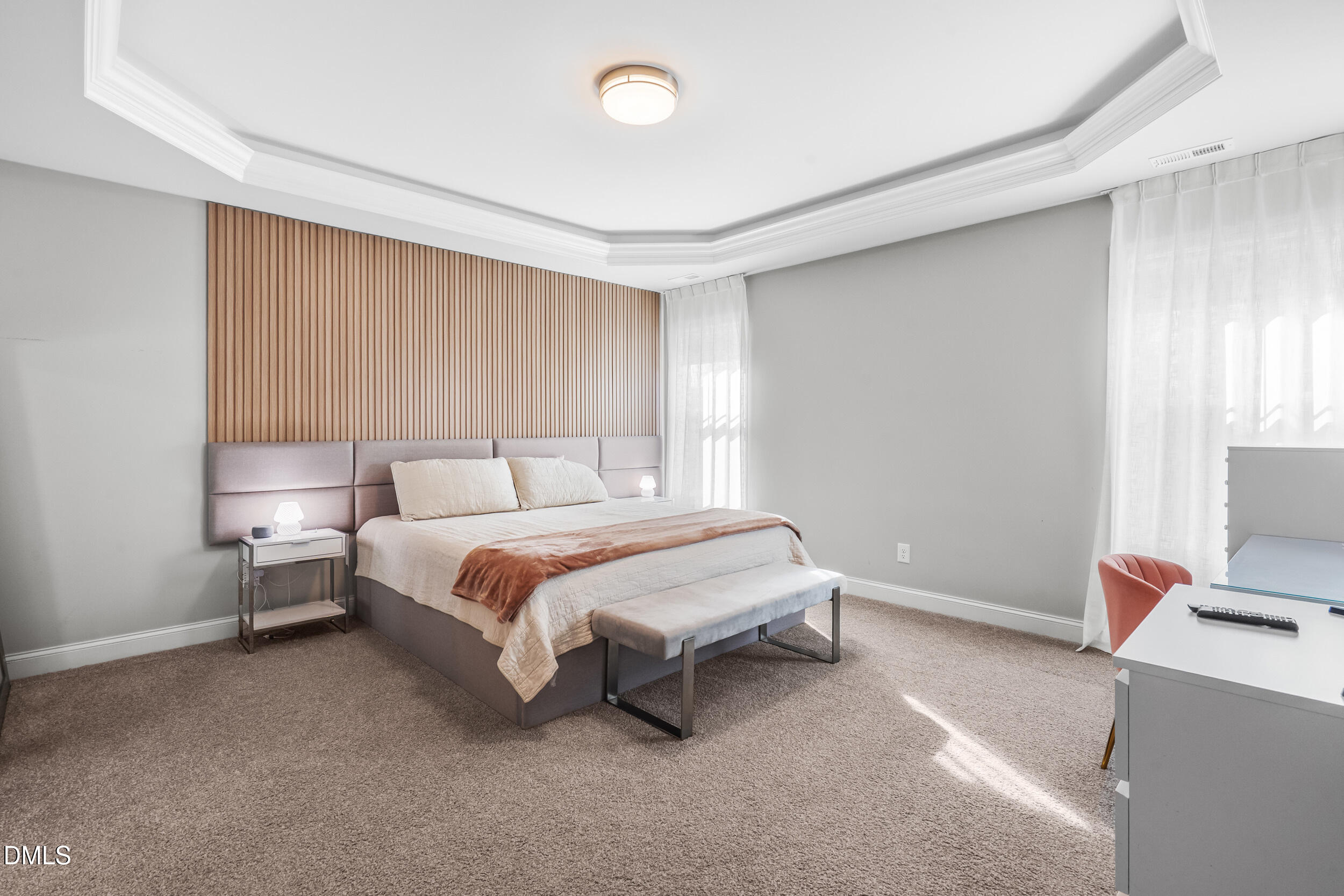 403 Airedale Trail Garner, NC 27529 - Photo 23 of 48 a spacious bedroom with a bed and a window