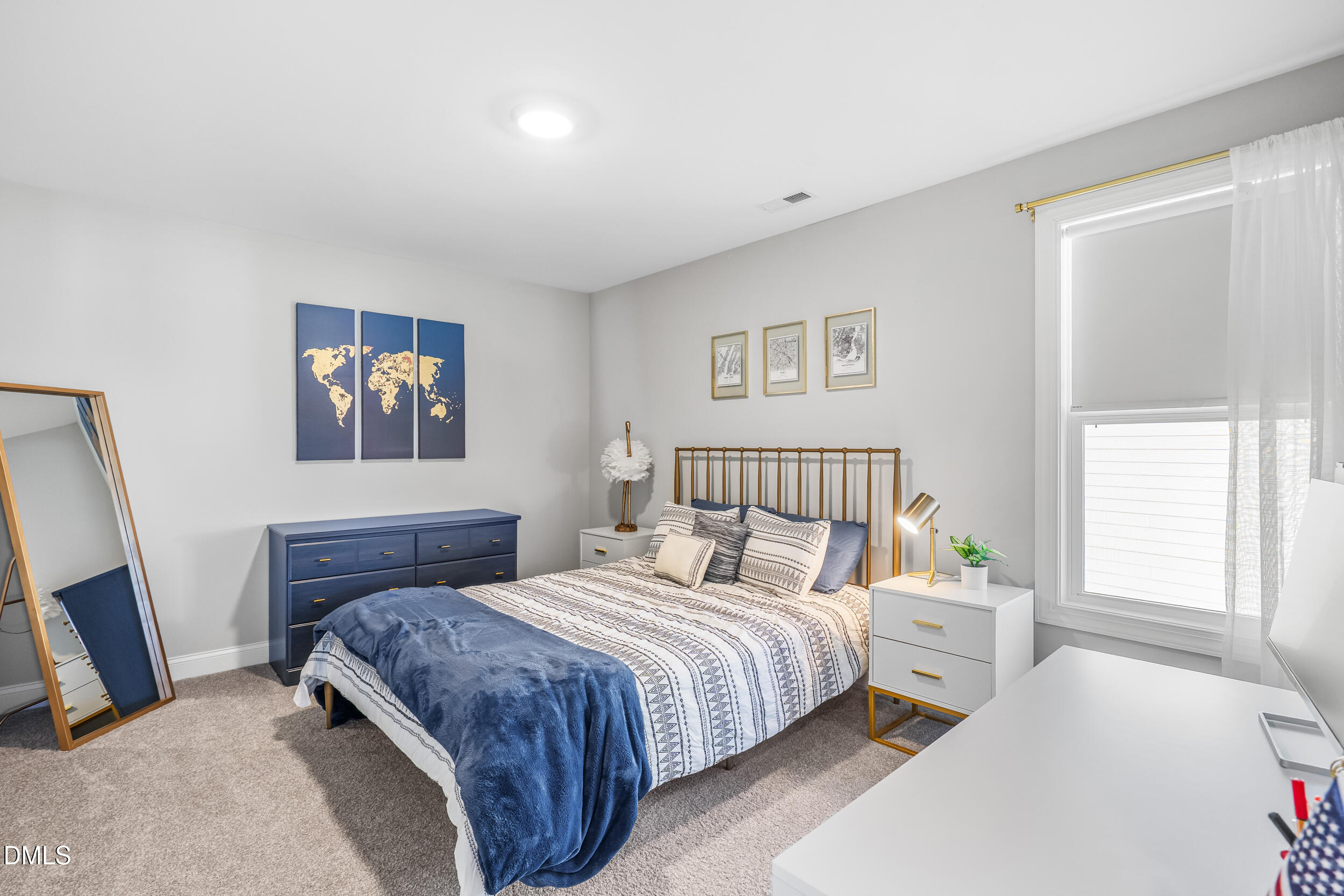 403 Airedale Trail Garner, NC 27529 - Photo 31 of 48 a bedroom with bed and a window