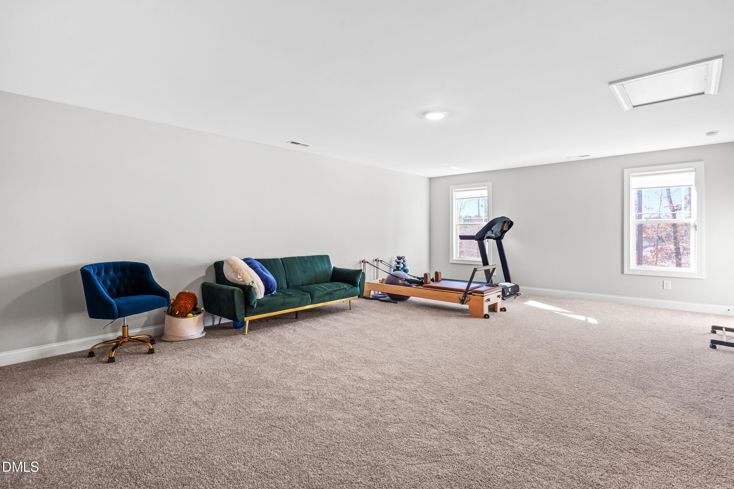 403 Airedale Trail Garner, NC 27529 - Photo 35 of 48 a view of a room with gym equipment
