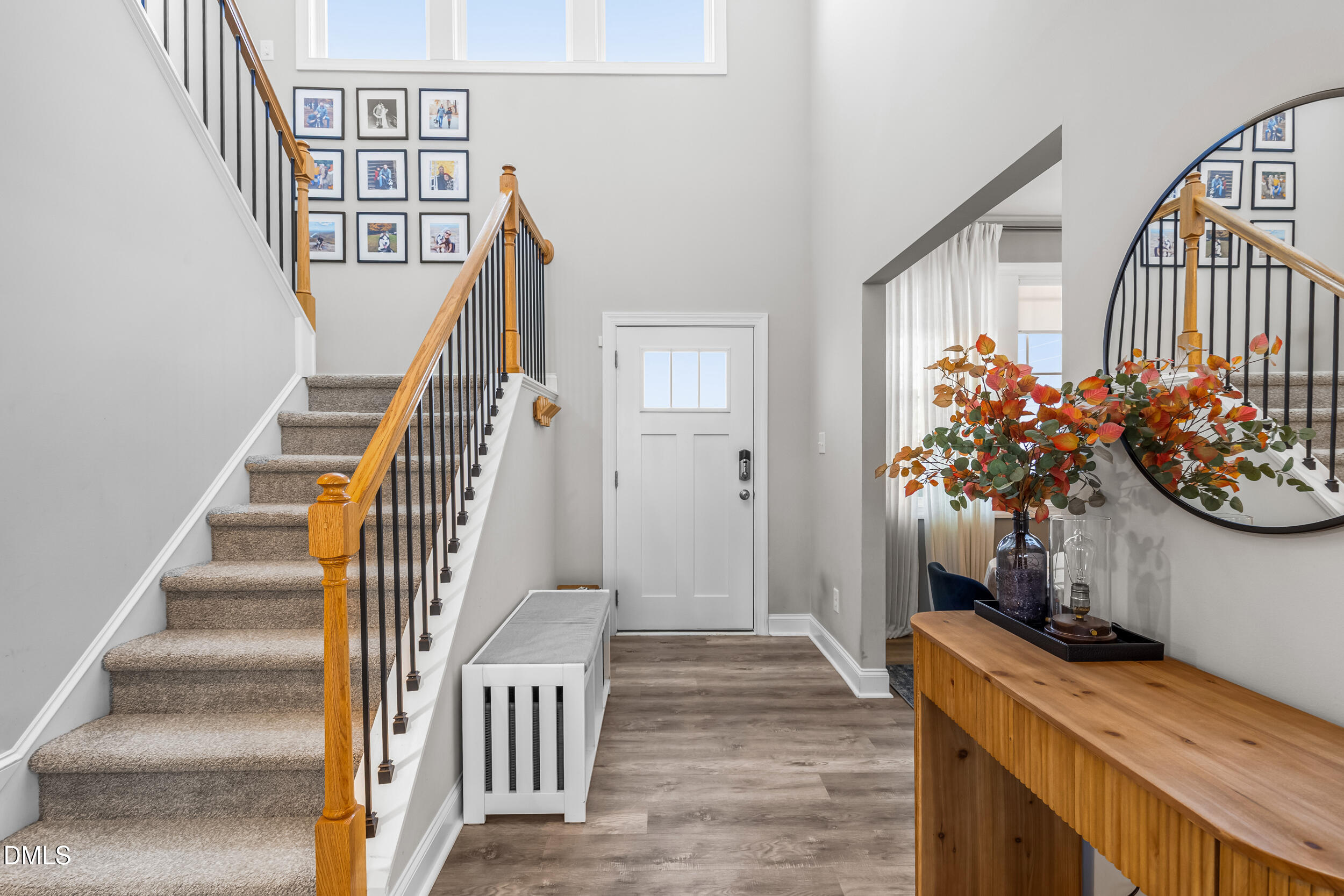 403 Airedale Trail Garner, NC 27529 - Photo 8 of 48 a view of entryway and hall with wooden floor