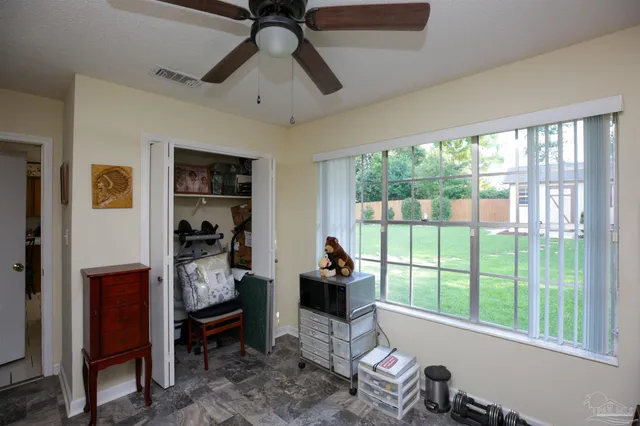 a room with furniture and a window