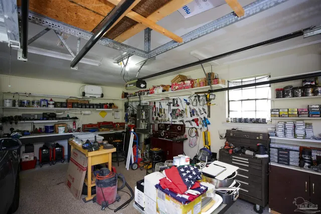 a view of a garage with storage
