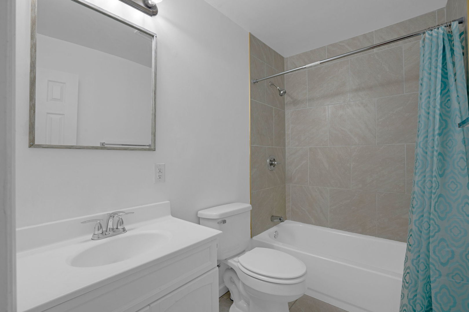 526 29th Avenue West Milan, IL 61264 - Photo 13 of 28 a bathroom with a sink toilet and shower