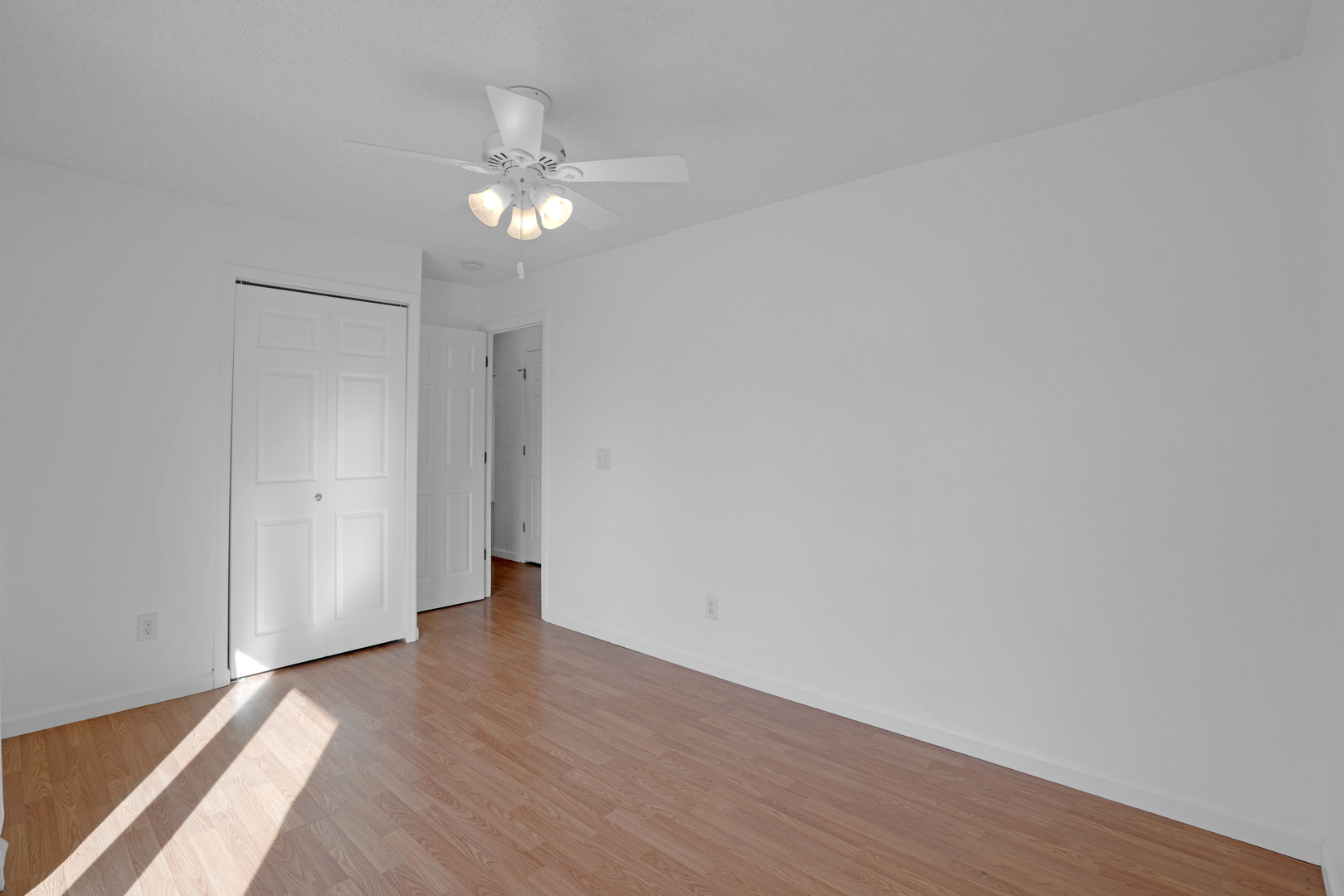 526 29th Avenue West Milan, IL 61264 - Photo 15 of 28 a view of an empty room with wooden floor