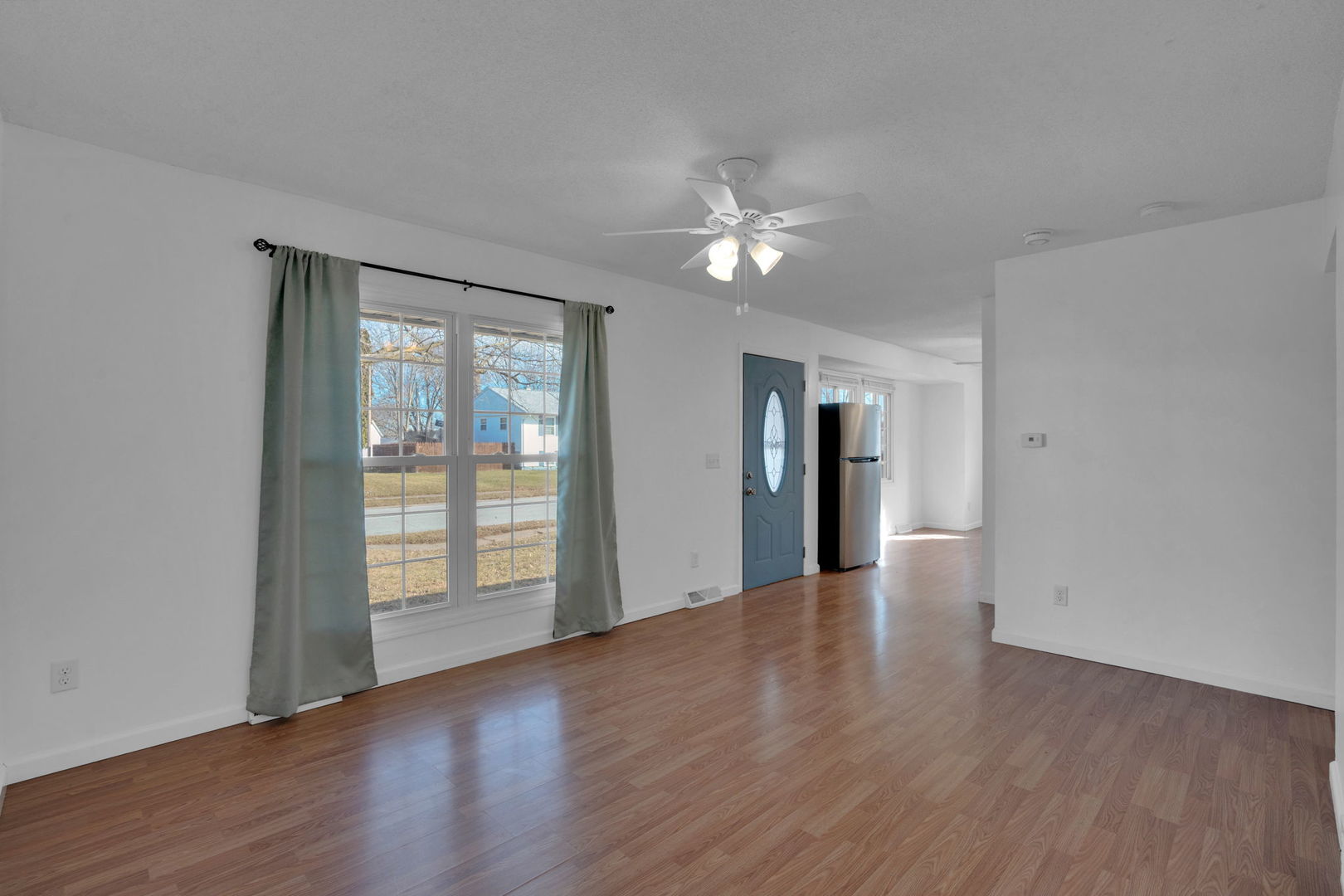 526 29th Avenue West Milan, IL 61264 - Photo 23 of 28 wooden floor in an empty room with a window