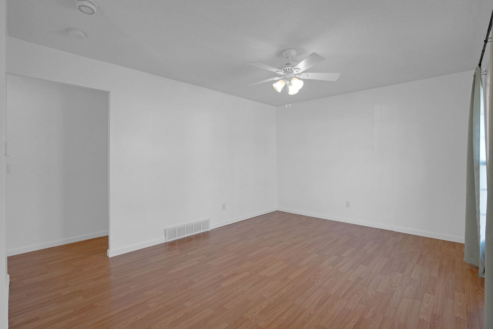 526 29th Avenue West Milan, IL 61264 - Photo 25 of 28 a view of an empty room with wooden floor