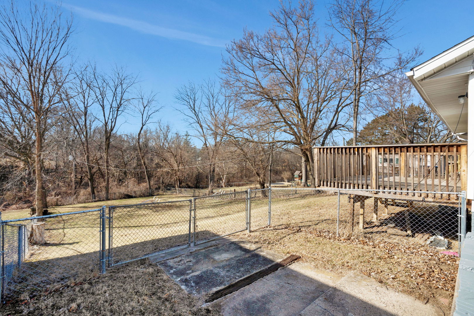 526 29th Avenue West Milan, IL 61264 - Photo 27 of 28 a view of a yard with wooden fence
