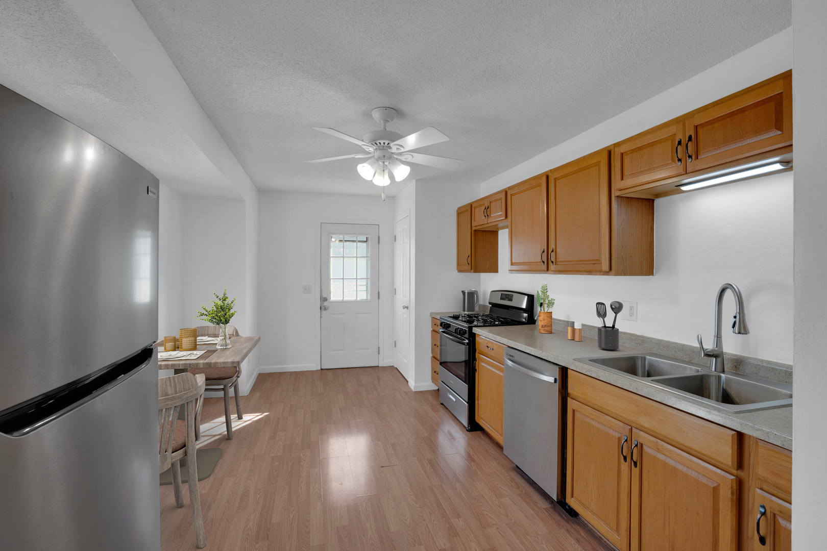 526 29th Avenue West Milan, IL 61264 - Photo 9 of 28 a kitchen with a sink cabinets and window