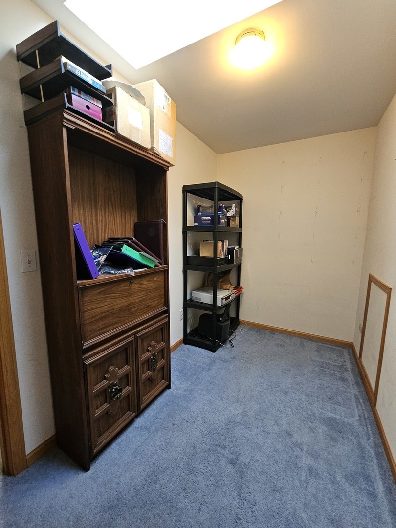 2013 Jeffrey Lane, Unit 2013 Elgin, IL 60123 - Photo 20 of 27 a view of an empty room with furniture and a window
