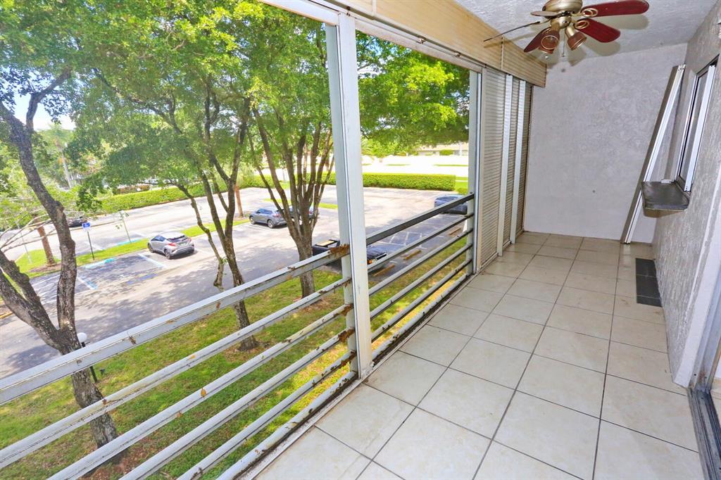 9151 Lime Bay Boulevard, Unit 310 Tamarac, FL 33321 - Photo 10 of 30 a view of an outdoor space and seating area