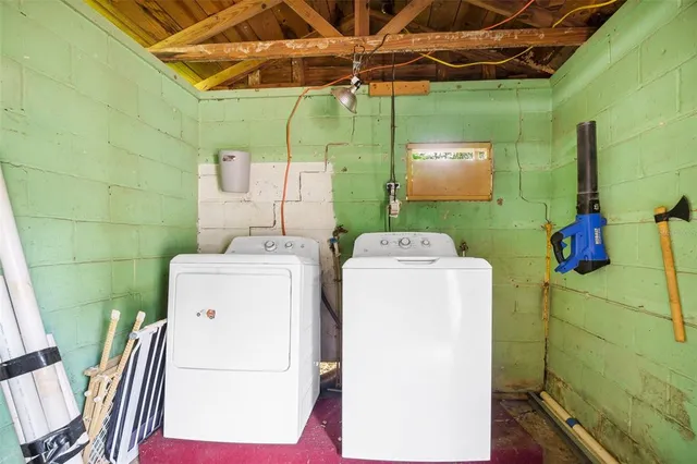 a utility room with dryer and washer