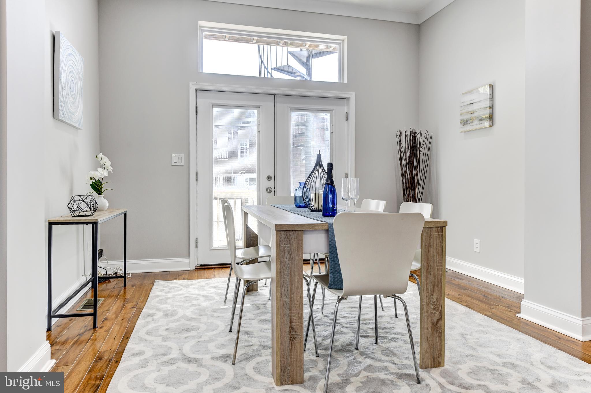 70 T Street Northwest, Unit 1 Washington, DC 20001 - Photo 13 of 37 Dining area with patio doors to rear deck