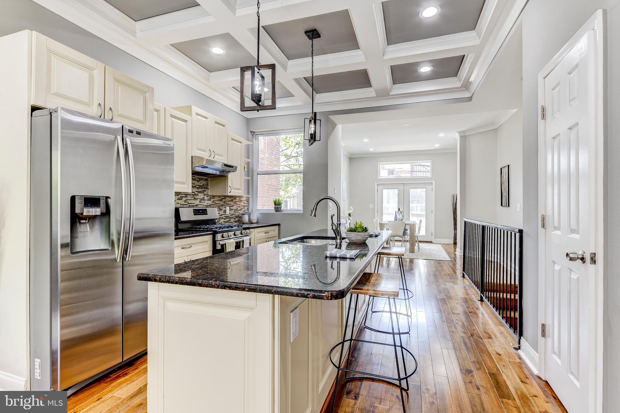 70 T Street Northwest, Unit 1 Washington, DC 20001 - Photo 9 of 37 Chef's kitchen with coffered ceilings