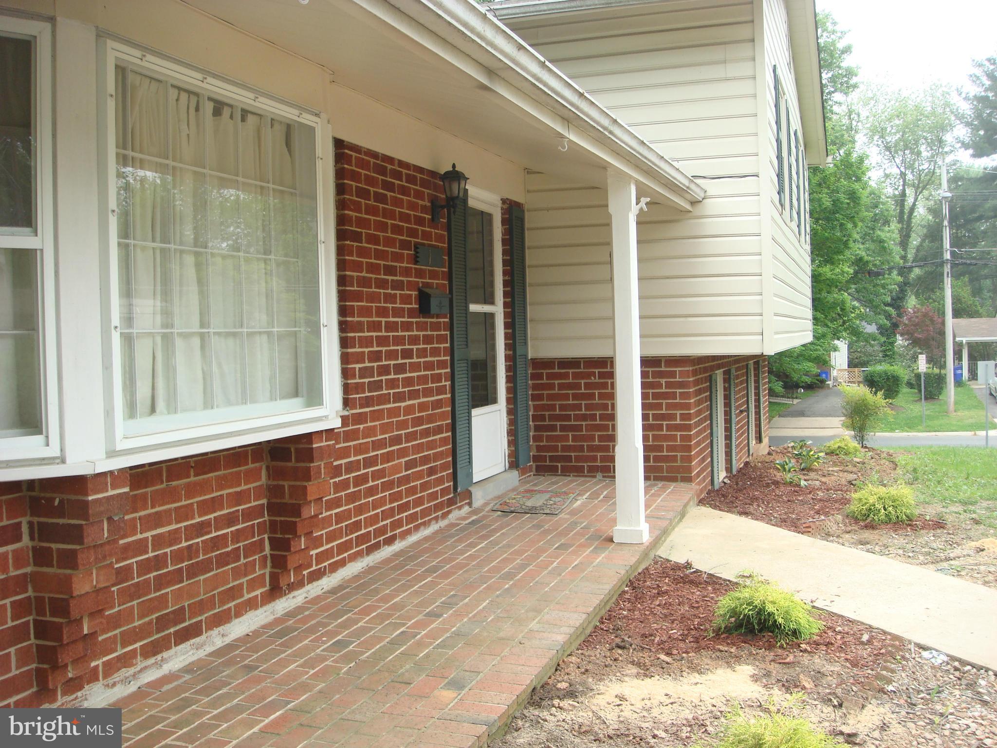 1 Tifton Court Potomac, MD 20854 - Photo 22 of 24 a view of house with backyard and trees