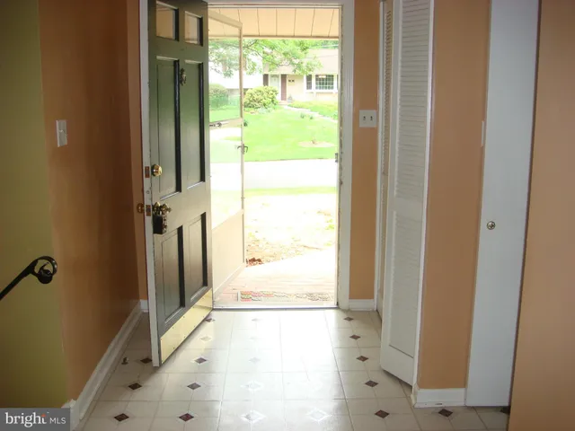 a view of a bathroom with a tub and a shower