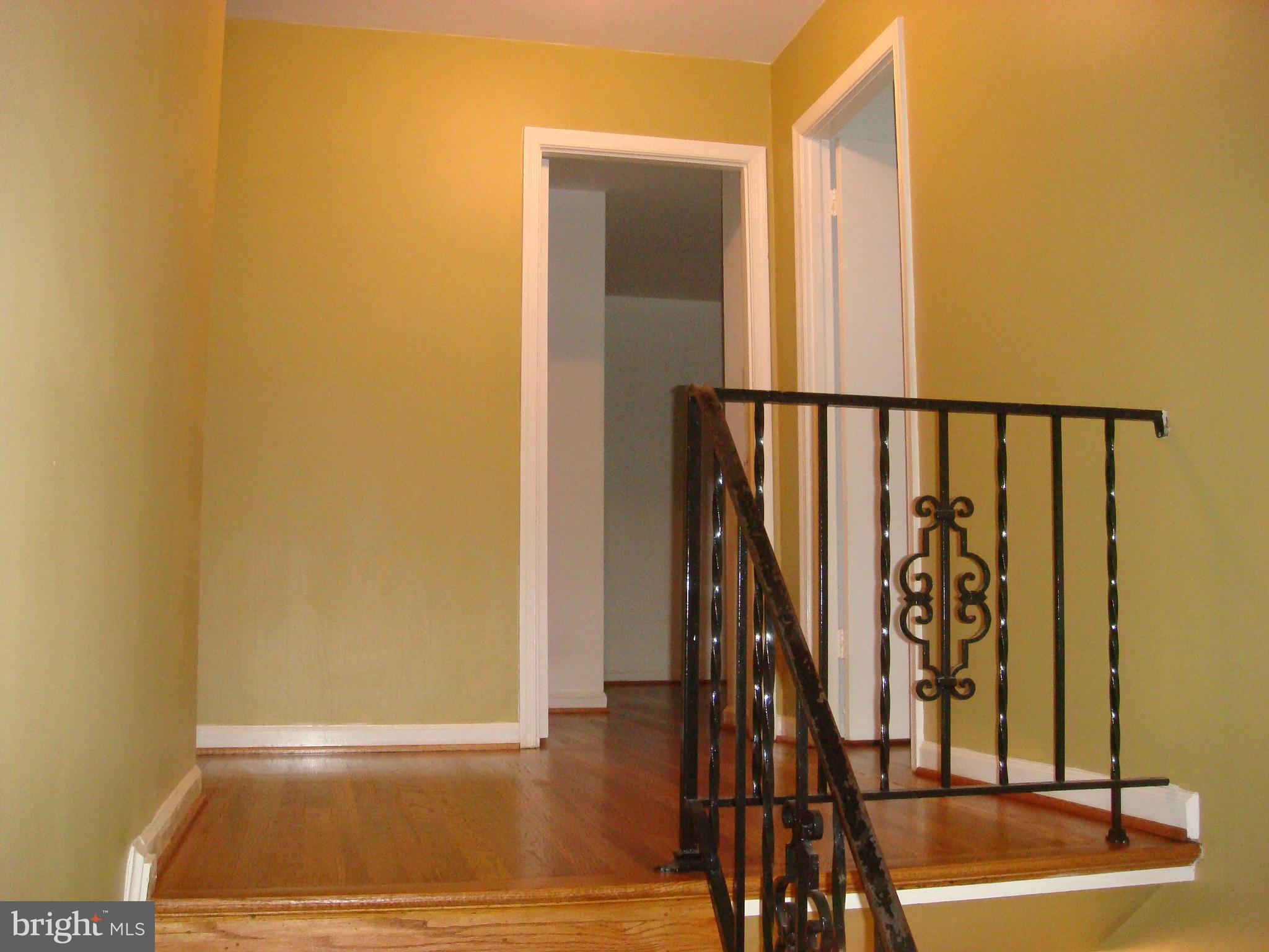 1 Tifton Court Potomac, MD 20854 - Photo 8 of 24 a view of entryway with wooden floor