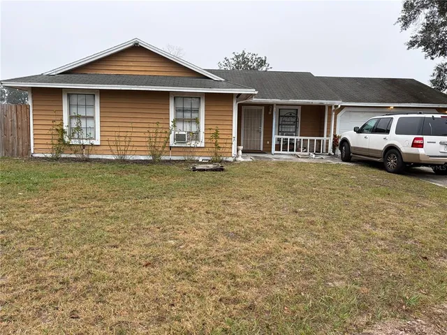 a house view with a garden space