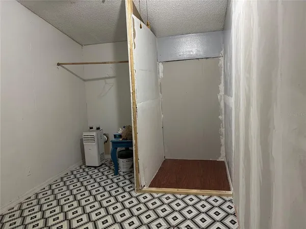 a bathroom with a sink and a shower