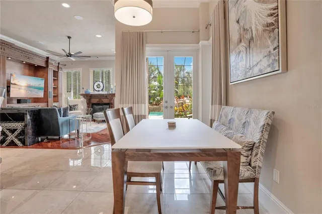 a large kitchen with a large counter top sink and stainless steel appliances