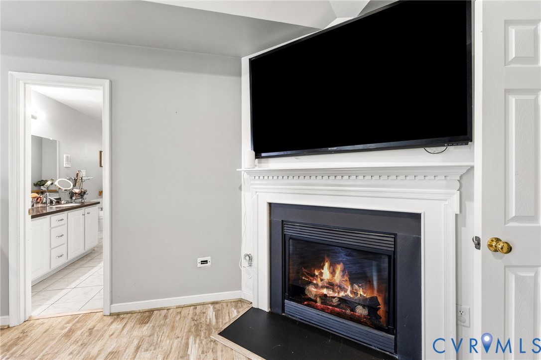 3120 Denise Road Petersburg, VA 23805 - Photo 46 of 51 Gas fireplace with a traditional white mantel and