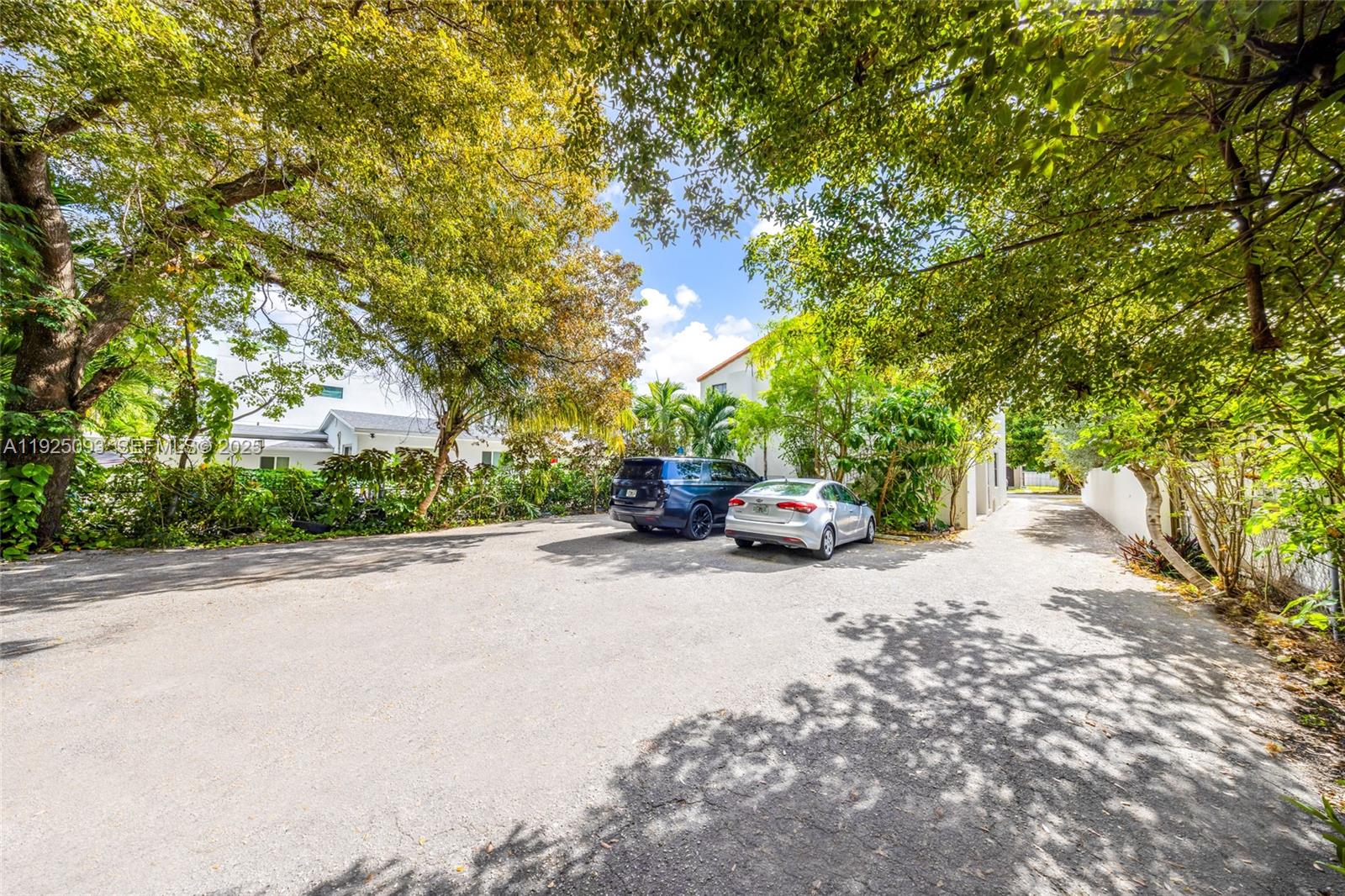 3453 Southwest 23rd Terrace, Unit 1 Miami, FL 33145 - Photo 20 of 22 a view of a house with a tree in front