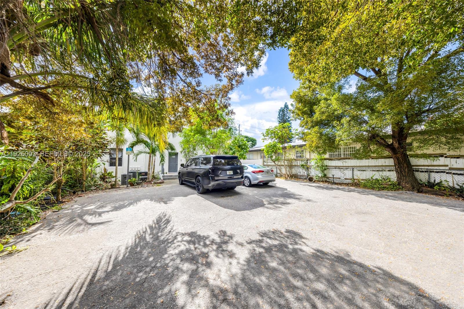 3453 Southwest 23rd Terrace, Unit 1 Miami, FL 33145 - Photo 21 of 22 a view of a car parked on the side of a road