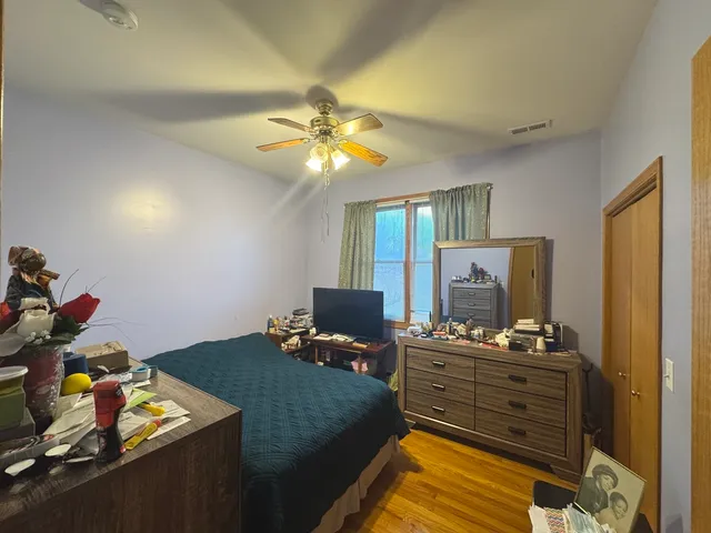 a bedroom with a bed and furniture