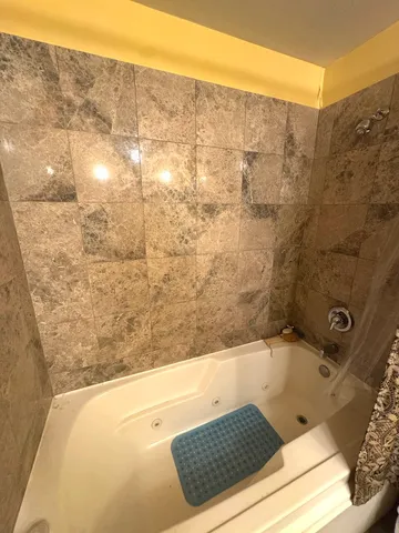 a view of a balcony with chairs