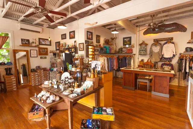 a view of a room with lots of wooden furniture