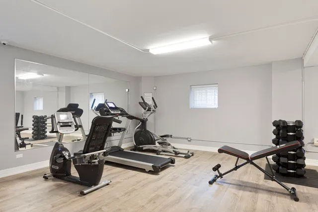 a view of a room with gym equipment