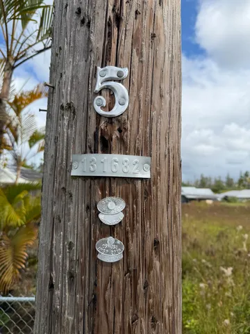 a view of entryway and kitchen with furniture