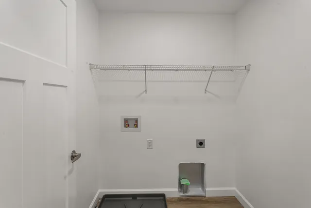 a view of small space with racks on the wall