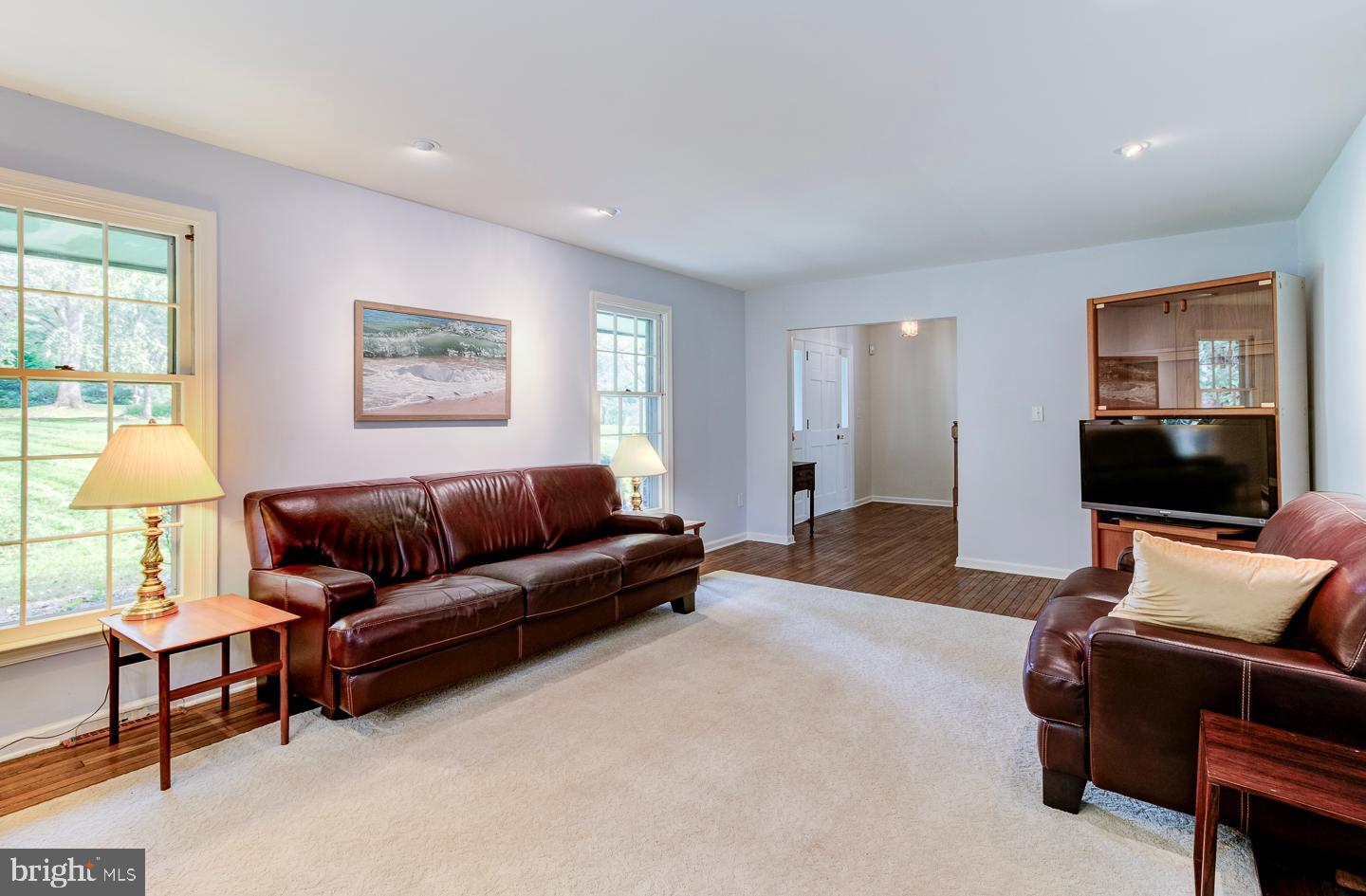 469 Dean Drive Kennett Square, PA 19348 - Photo 12 of 47 a living room with furniture and a flat screen tv