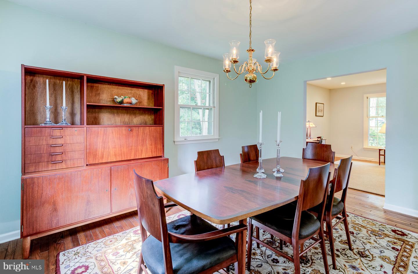 469 Dean Drive Kennett Square, PA 19348 - Photo 14 of 47 a view of a dining room with furniture and chandelier
