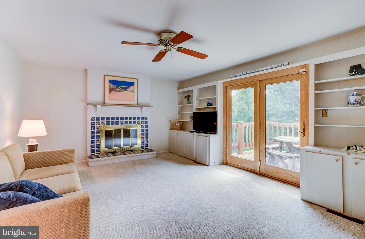 469 Dean Drive Kennett Square, PA 19348 - Photo 21 of 47 a living room with furniture and a fireplace