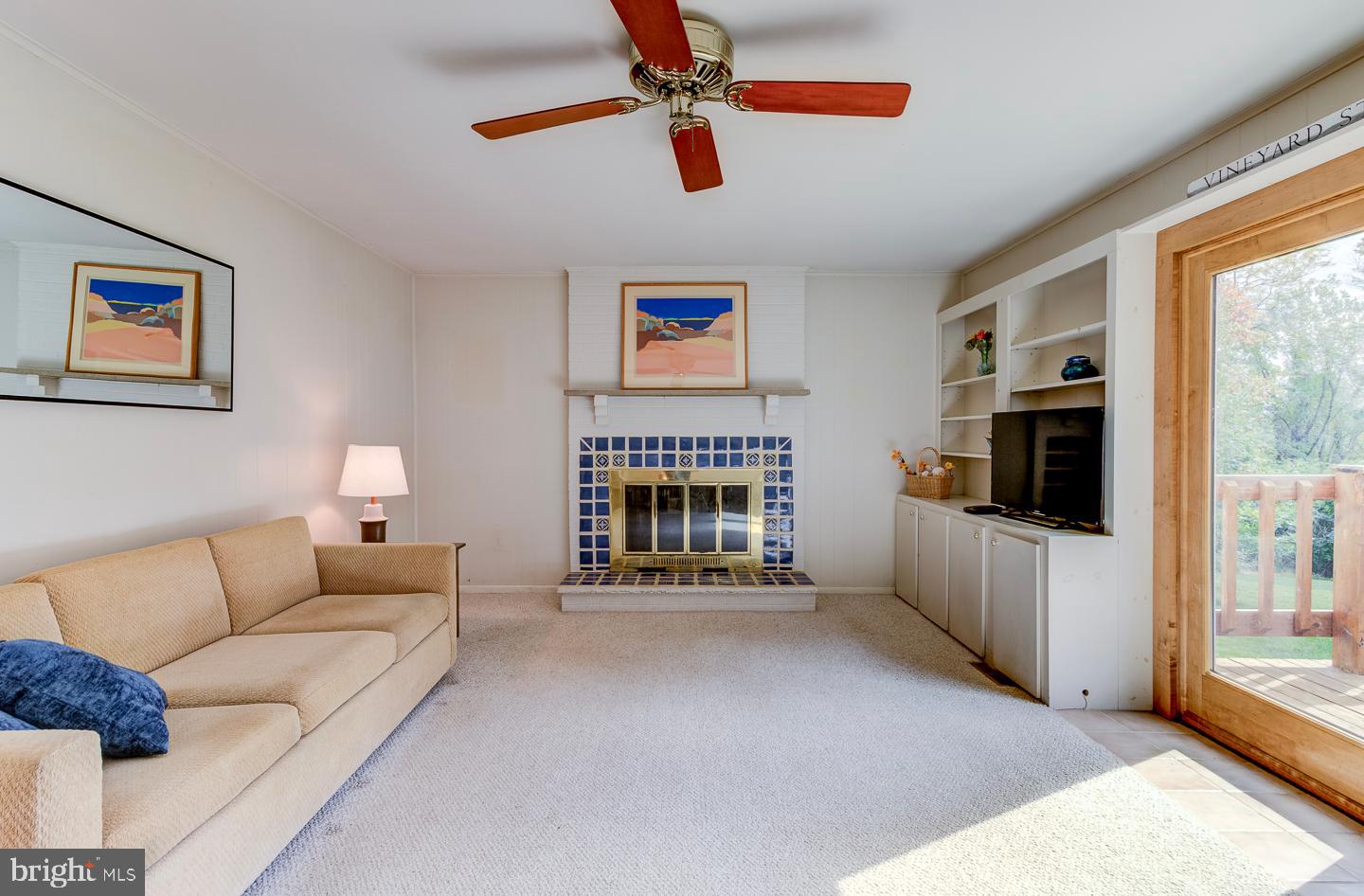 469 Dean Drive Kennett Square, PA 19348 - Photo 22 of 47 a living room with furniture and a flat screen tv