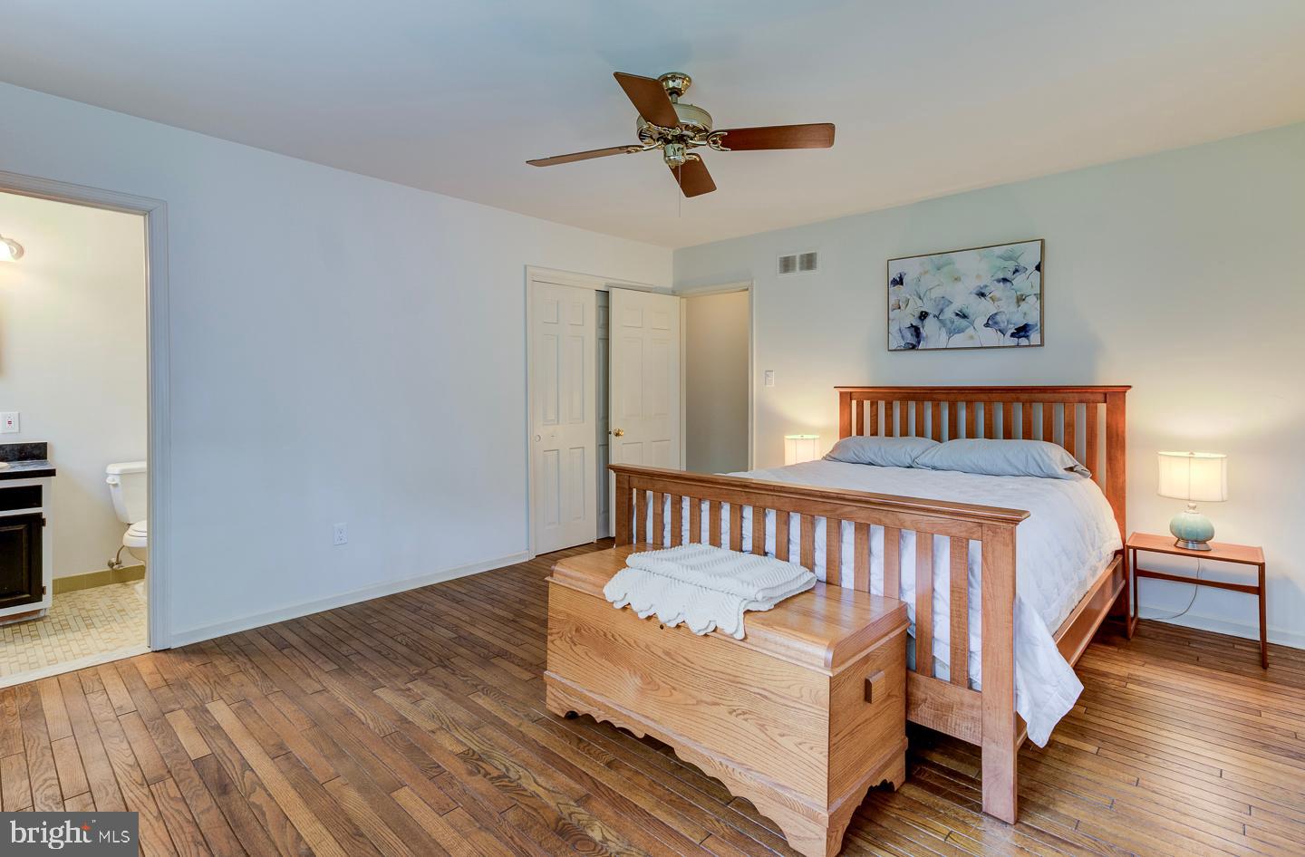 469 Dean Drive Kennett Square, PA 19348 - Photo 27 of 47 a bedroom with a bed and wooden floor