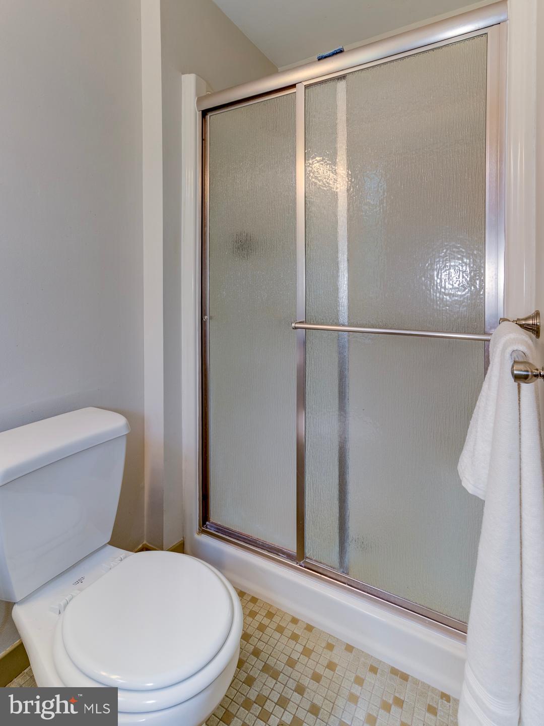 469 Dean Drive Kennett Square, PA 19348 - Photo 31 of 47 a white toilet sitting next to a shower